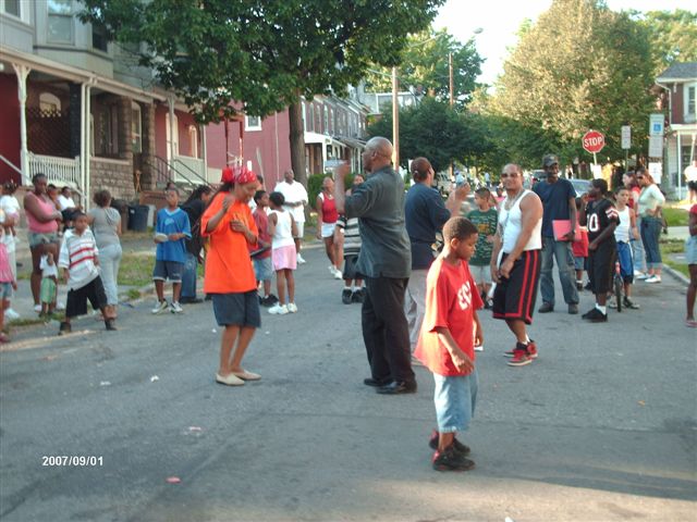 Diane White, at the block party where this all started. Diane is in the orange shirt. Summer