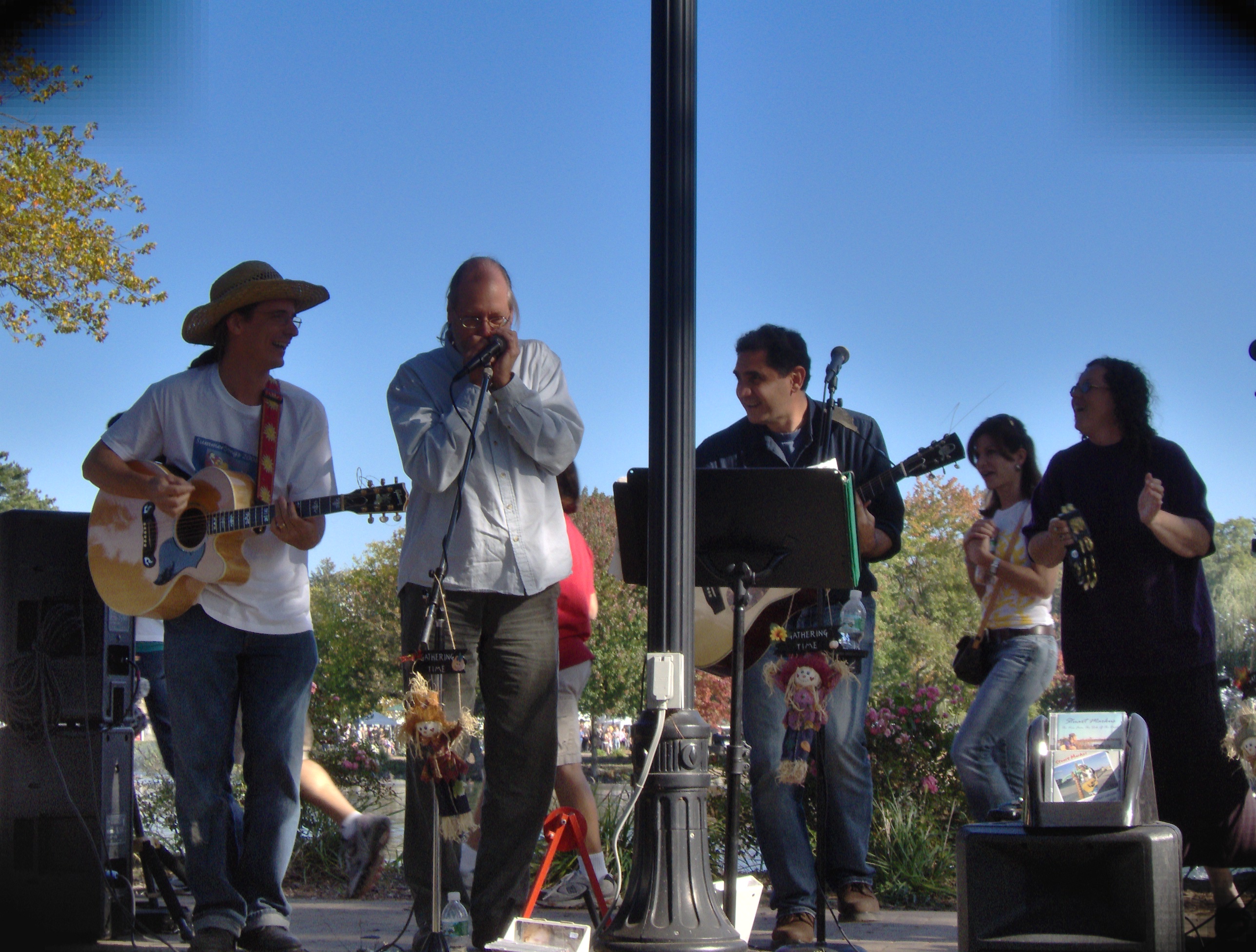 Hank Stone play harmonica at the Huntington Fall Festival